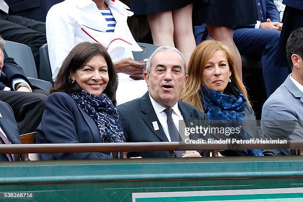 Mayor of Paris Anne Hidalgo, President of French Tennis Federation Jean Gachassin and French Prime Minister's wife, violonist Anne Gravoin attend Day...