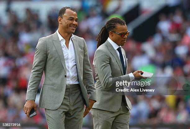 Cafu and Edgar Davids walk out with the Rest of the World team prior to the Soccer Aid 2016 match in aid of UNICEF at Old Trafford on June 5, 2016 in...