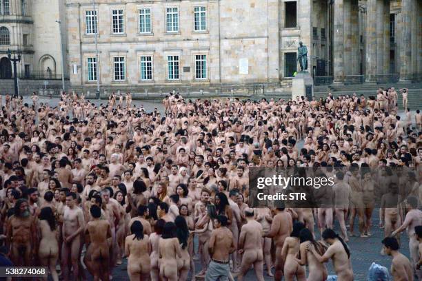 More than 6,000 Colombians pose in the nude for American art photographer Spencer Tunick at Bolivar Square in Bogota, on June 5, 2016. - Tunick,...