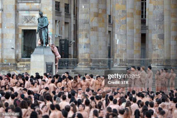 More than 6,000 Colombians pose in the nude for American art photographer Spencer Tunick at Bolivar Square in Bogota, on June 5, 2016. - Tunick,...