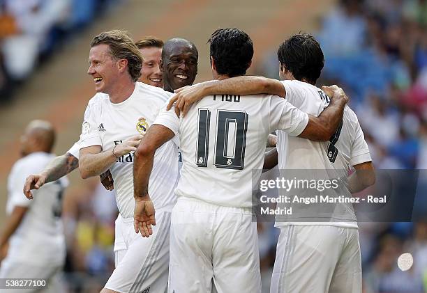 Steve McManaman of Real Madrid Legends celebrates with team mates after scoring their team's second goal during the Corazon Classic charity match...