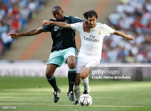 Ral Gonzlez of Real Madrid Legends and Kiki Musampa of Ajax AFC Legends compete for the ball during the Corazon Classic charity match between Real...