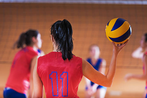 volleyball player with a ball. - girls volleyball stock pictures, royalty-free photos & images