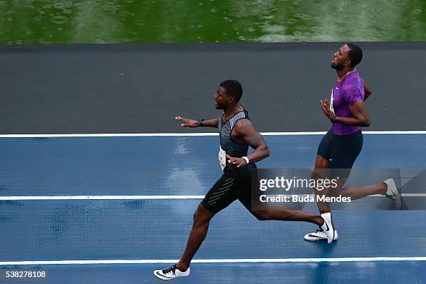 Justin Gatlin of the United States , runs against Richard Thompson of Trinidad and Tobago during the "Mano a Mano" challenge at the Quinta da Boa...