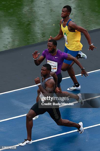 Justin Gatlin of the United States , runs against Richard Thompson of Trinidad and Tobago and Vitor Hugo Santos of Brazil during the "Mano a Mano"...