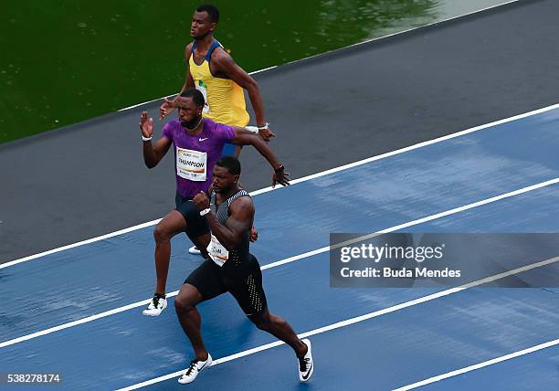 Justin Gatlin of the United States , runs against Richard Thompson of Trinidad and Tobago and Vitor Hugo Santos of Brazil during the "Mano a Mano"...