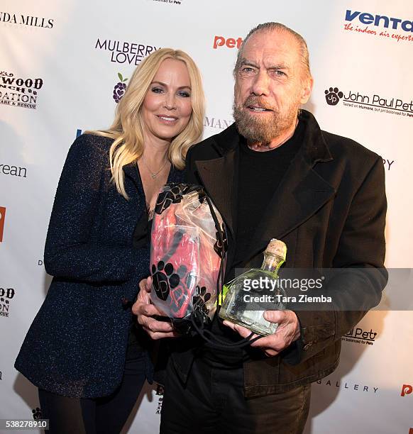 John Paul DeJoria and his wife Eloise attend the 2nd Annual Art for Animals Fundraiser Evening For Eastwood Ranch Foundation at De Re Gallery on June...