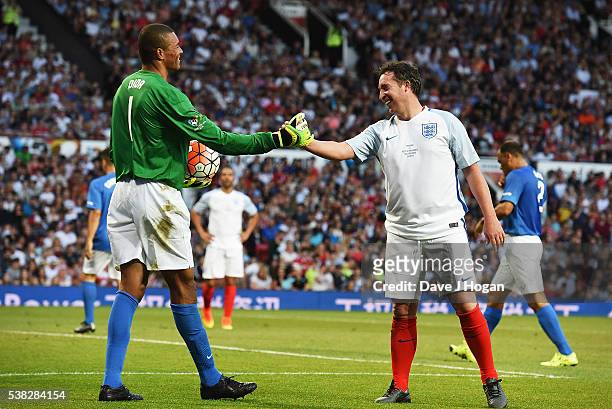 Robbie Fowler and Dida play during Soccer Aid at Old Trafford on June 5, 2016 in Manchester, England.
