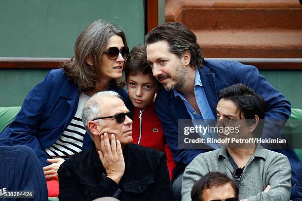 French actor Guillaume Gallienne, his wife Amandine and his son attend the French Tennis Open Day Fifteen with the Final between Novak Djokovic and...