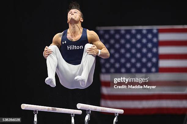 Paul Ruggeri III competes on the parallel bars during the 2016 Men's P&G Gymnastics CHampionships at the XL Center on June 5, 2016 in Hartford,...