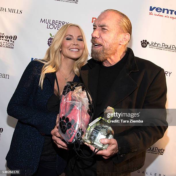 Actress Eloise DeJoria and CEO of John Paul Mitchell Systems John Paul DeJoria attend the 2nd Annual Art for Animals fundraiser at De Re Gallery at...