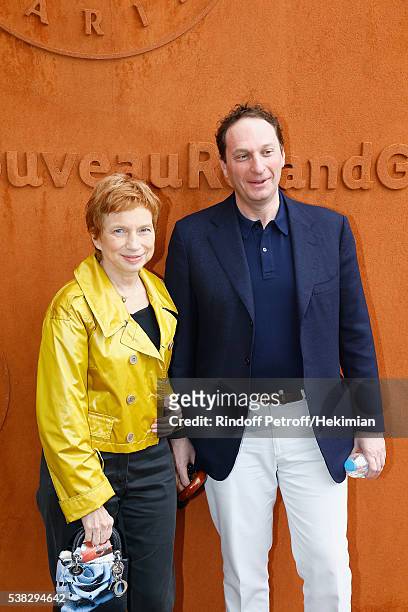 Laurence Parisot and her husband attend the French Tennis Open Day Fifteen with the Final between Novak Djokovic and Andy Murray at Roland Garros on...