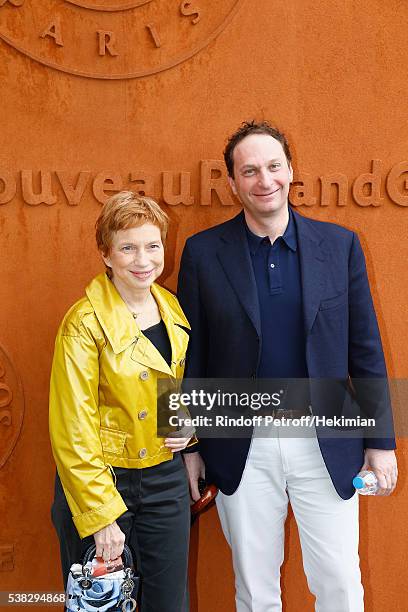 Laurence Parisot and her husband attend the French Tennis Open Day Fifteen with the Final between Novak Djokovic and Andy Murray at Roland Garros on...