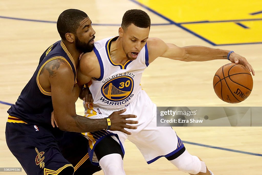 Stephen Curry of the Golden State Warriors drives with the ball... News