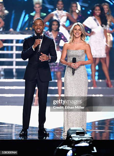 Co-hosts Terrence J and Julianne Hough speak onstage during the 2016 Miss USA pageant at T-Mobile Arena on June 5, 2016 in Las Vegas, Nevada.