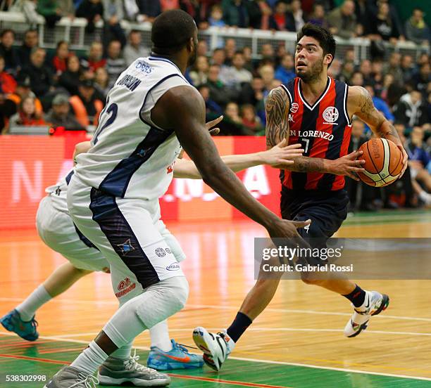 Nicolas Aguirre of San Lorenzo fights for the ball with Anthony Johnson of Bahia Basket during a match between San Lorenzo and Weber Bahia as part of...