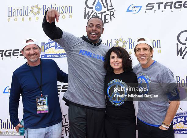 President and Co-Founder of the Harold Robinson Foundation David Moss, NBA player Paul Pierce, Joyce Hyser Robinson and guest arrive at the 6th...