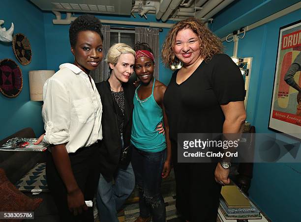 Playwright Danai Gurira, actress Sarah Paulson, actress Lupita Nyong'o and director Liesl Tommy pose for a photo backstage at Broadway's 'Eclipsed'...