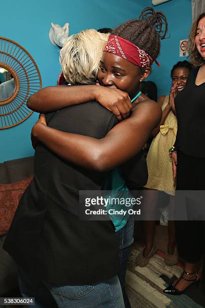 Actress Lupita Nyong'o greets actress Sarah Paulson backstage at Broadway's ÒEclipsedÓ following a special dedication and announcement of a West...