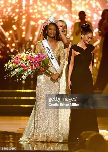 Miss District of Columbia USA 2016 Deshauna Barber reacts as she is crowned Miss USA 2016 by Miss USA 2015 Olivia Jordan and Miss Universe 2015 Pia...