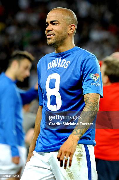 Kieron Dyer wears Edgar Davids' shirt backwards during Soccer Aid at Old Trafford on June 5, 2016 in Manchester, England.