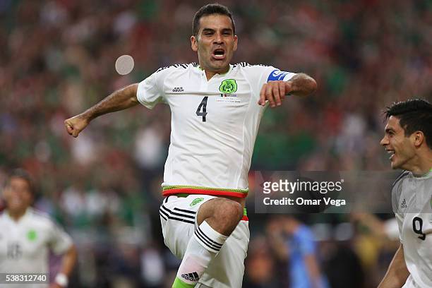 Rafael Marquez of Mexico celebrates after scoring the second goal of his team during a group C match between Mexico and Uruguay at University of...
