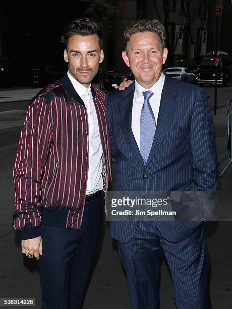 Playwright John Logan and guest attend the "Genius" New York premiere at Museum of Modern Art on June 5, 2016 in New York City.