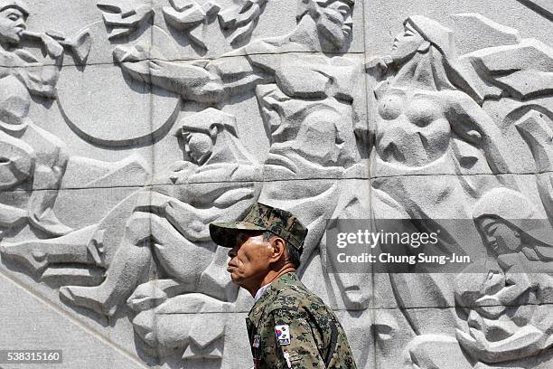 South Korean man visits at Seoul national cemetary during a ceremony marking Korean Memorial Day at the Seoul National Cemetery on June 6, 2016 in...