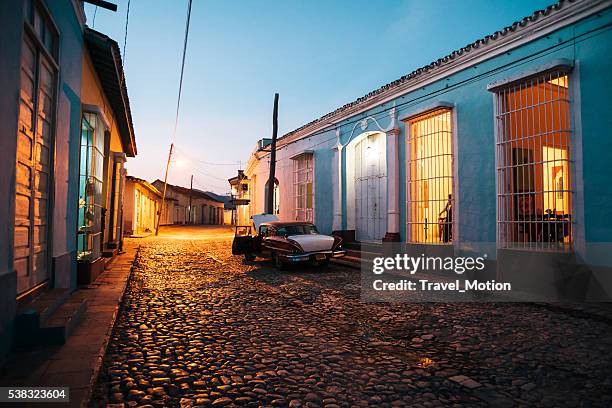 cobblestone street at night, trinidad, cuba - spanish-colonial-architecture stock pictures, royalty-free photos & images