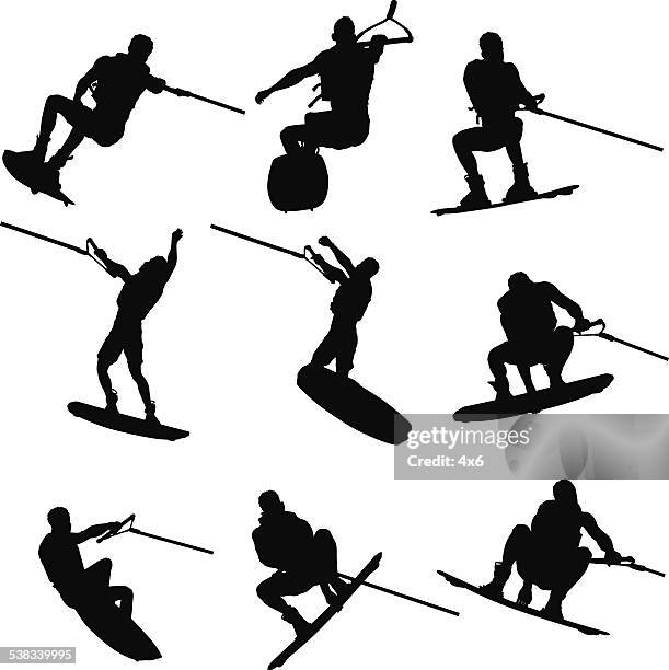 wake boarder doing tricks - water skiing stock illustrations