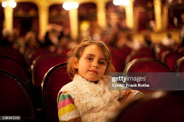 young kid in a opera house or theatre - spettatore opera foto e immagini stock