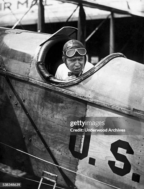 Air Mail pilot C Eugene Johnson starts off from Curtiss Field on Long Island on the first leg of the coast to coast air mail service between New York...