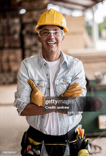 carpenter wearing protective workwear - apron gloves stock pictures, royalty-free photos & images