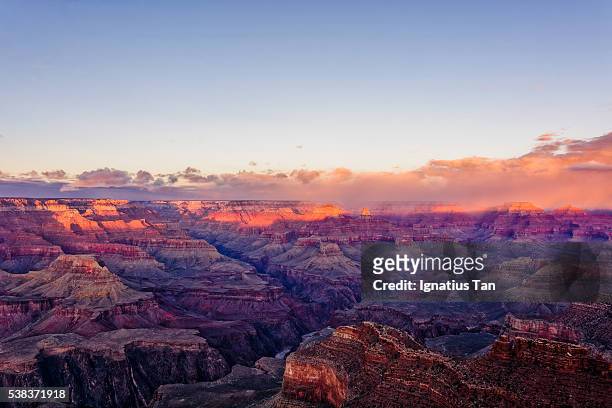 sunset over grand canyon with low clouds - ignatius tan stock pictures, royalty-free photos & images