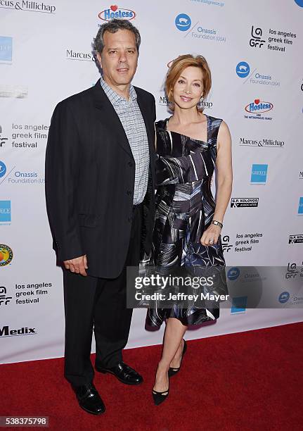 Actress Sharon Lawrence and husband Dr. Tom Apostle attend the 2016 LA Greek Film Festival premiere of 'Worlds Apart' at the Egyptian Theatre on June...