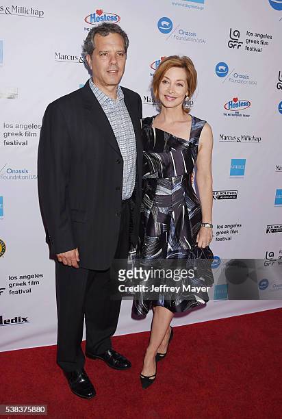 Actress Sharon Lawrence and husband Dr. Tom Apostle attend the 2016 LA Greek Film Festival premiere of 'Worlds Apart' at the Egyptian Theatre on June...