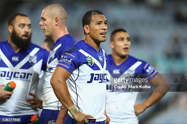 William Hopoate of the Bulldogs looks dejected as he watches the big screen after a try during the round 13 NRL match between the Canterbury Bulldogs...