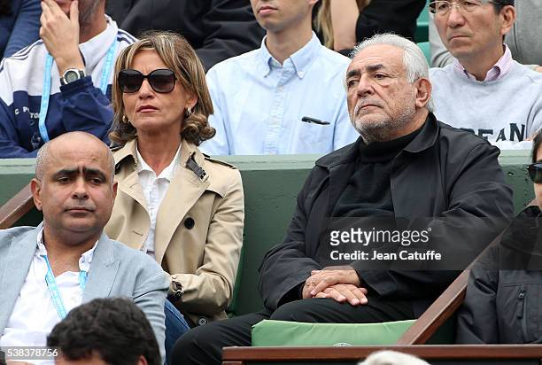 Dominique Strauss Kahn aka DSK and his girlfriend Myriam L'Aouffir attend the Men's Singles final between Novak Djokovic of Serbia and Andy Murray of...