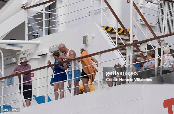 Passengers on board MS Thomson Spirit, a cruise ship owned by Holland America Line and operated under charter by the United Kingdom-based Thomson...