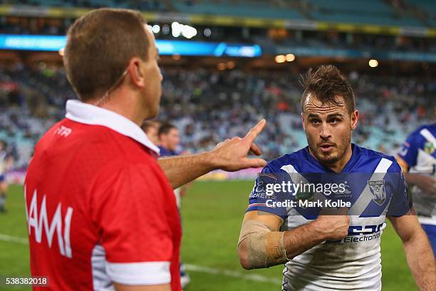 Referee Ben Cummins speaks to Josh Reynolds of the Bulldogs during the round 13 NRL match between the Canterbury Bulldogs and the Cronulla Sharks at...