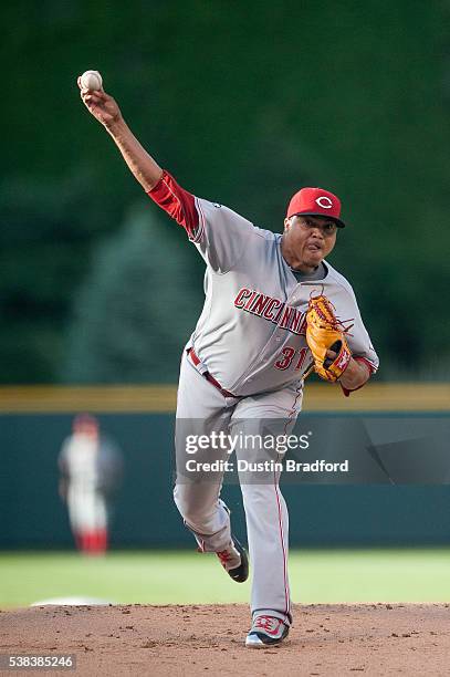 Alfredo Simon of the Cincinnati Reds pitches against the Colorado Rockies in the first inning of a game at Coors Field on June 2, 2016 in Denver,...