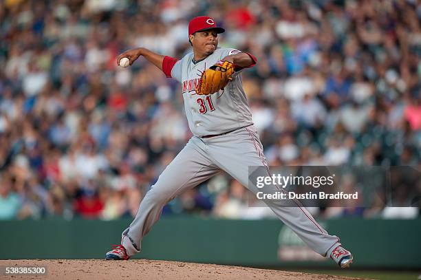 Alfredo Simon of the Cincinnati Reds pitches against the Colorado Rockies during a game at Coors Field on June 2, 2016 in Denver, Colorado.