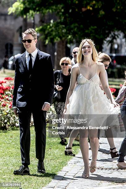 Actress Elle Fanning and director Nicolas Winding Refn attend the photocall of movie "The Neon Demon" on June 6, 2016 in Rome, Italy..