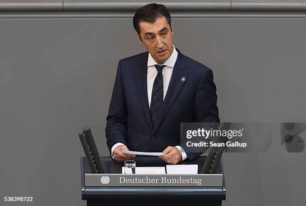 Cem Oezdemir, co-head of the German Greens party and himself of Turkish descent, speaks during discussions at the Bundestag prior to its passage of a...