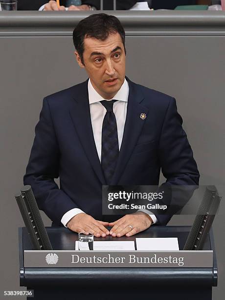 Cem Oezdemir, co-head of the German Greens party and himself of Turkish descent, speaks during discussions at the Bundestag prior to its passage of a...