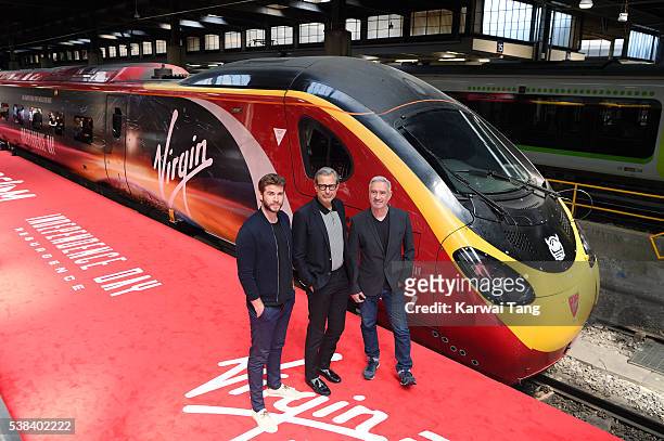 Liam Hemsworth, Jeff Goldblum and Roland Emmerich attend the official unveiling of the Independence Day: Resurgence wrapped train at Euston Station...