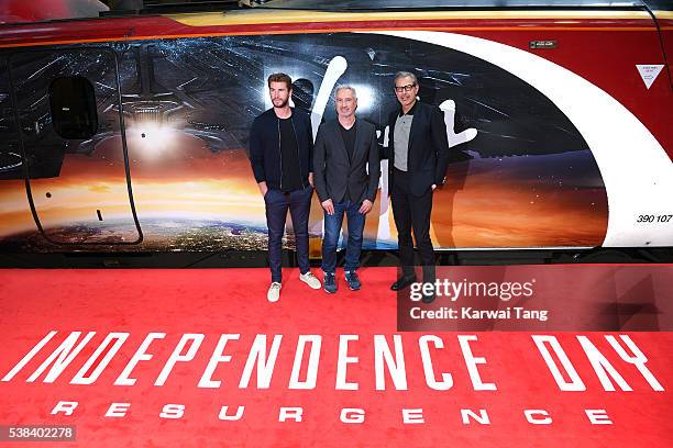 Liam Hemsworth, Roland Emmerich and Jeff Goldblum attend the official unveiling of the Independence Day: Resurgence wrapped train at Euston Station...