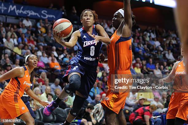 Carla Cortijo of the Atlanta Dream drives to the basket past Aneika Henry-Morello of the Connecticut Sun during the Atlanta Dream Vs Connecticut Sun,...