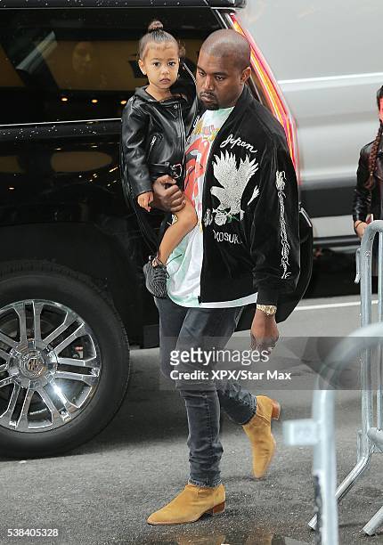 Kanye West and his daughter North West are seen on June 5, 2016 in New York City.