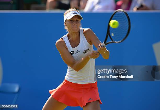 Magda Linette of Poland returns the ball in her first round match against Christina McHale of USA during WTA Aegon Open Nottingham - Day 1 at...